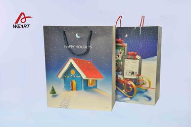 China Os sacos de papel do Natal da arte, presente original do Natal ensacam o punho azul do algodão fornecedor